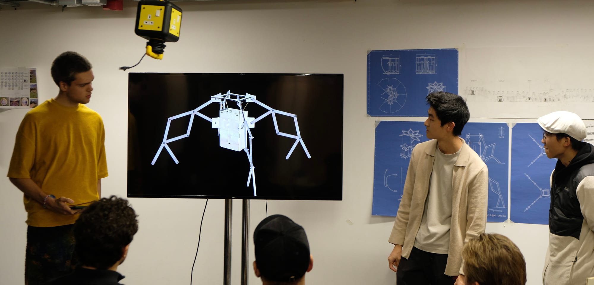 Final crit: L-R: myself, Jack and Rex. Blueprints in background.